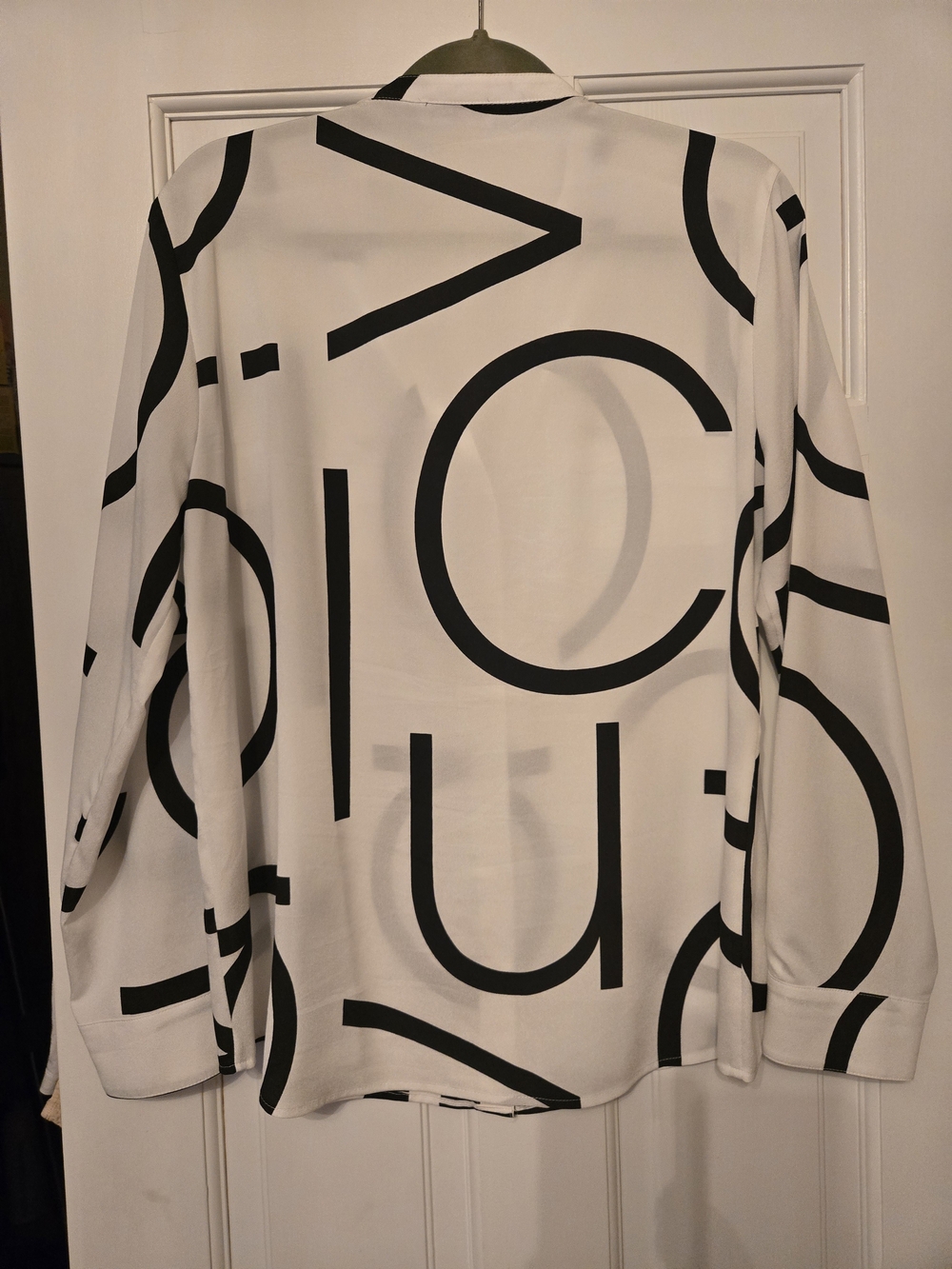 Calvin Klein Button-Up blouses with Geometric Prints - Picture 7 of 7